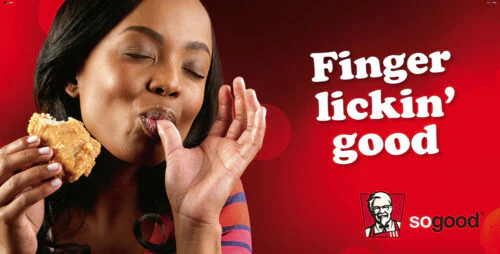 Black Woman Licking her fingers eating KPC